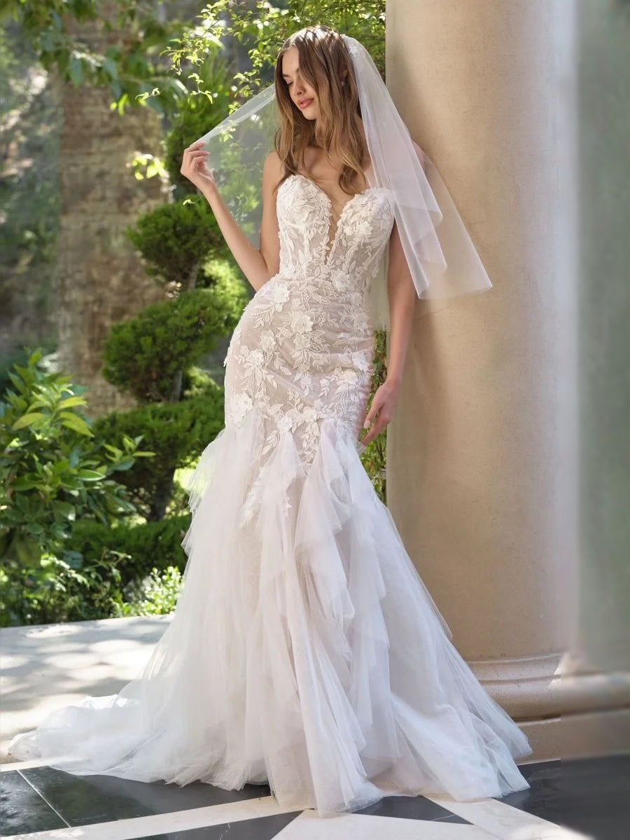 Ivory lace sweetheart mermaid wedding dress with layered tulle ruffles and veil