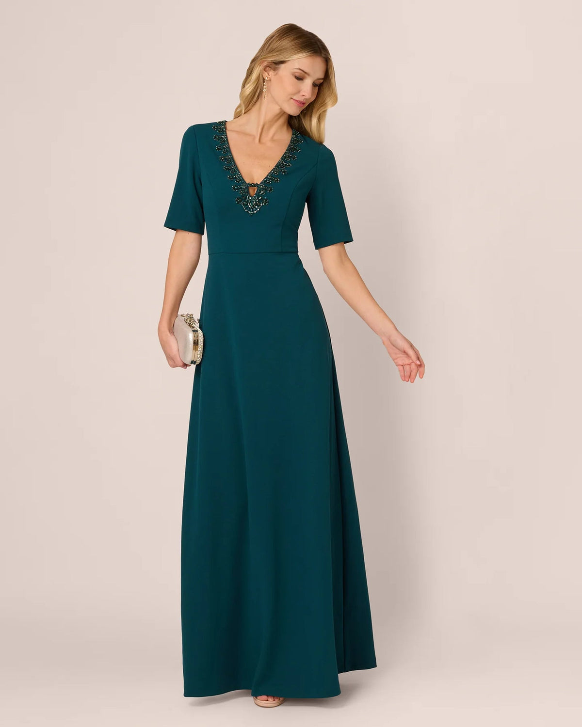 Teal A-line maxi dress with short sleeves and jeweled V-neck