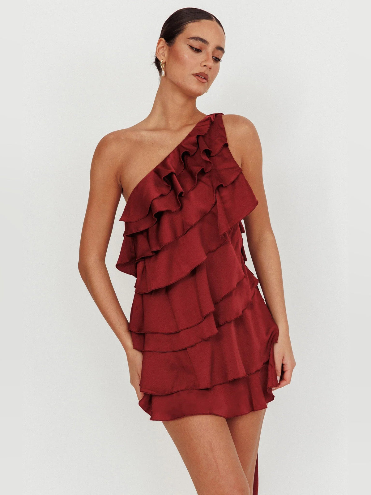 Wine tiered ruffled one-shoulder mini dress with layered ruffles, sleeveless bodice