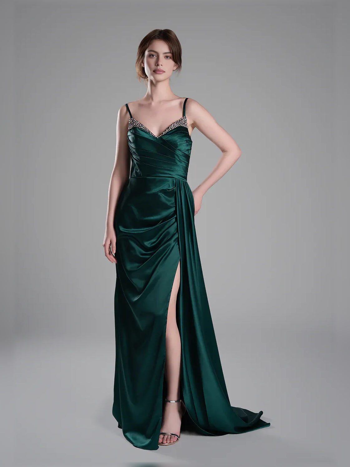 Peacock green satin V-neck formal dress with ruching, spaghetti straps, and high slit.