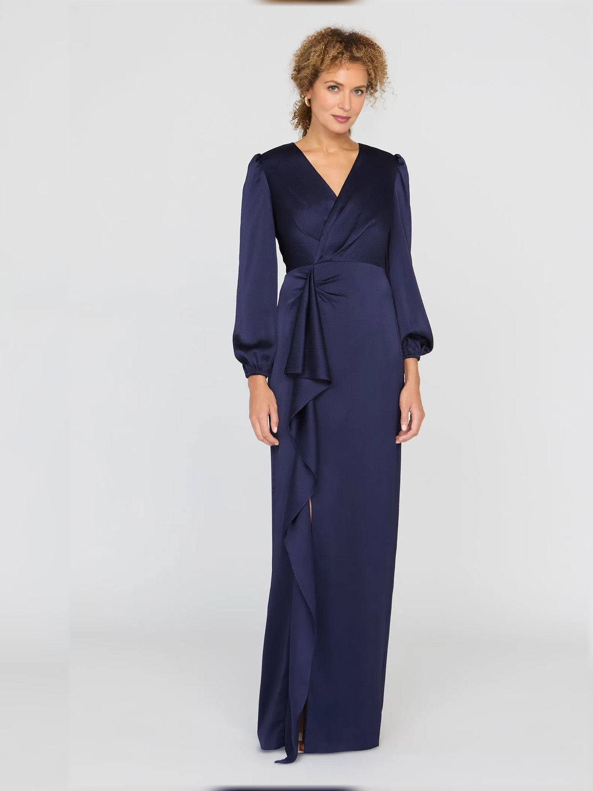 Dark navy satin V-neck column dress with draped waist bow, long sleeves, side slit