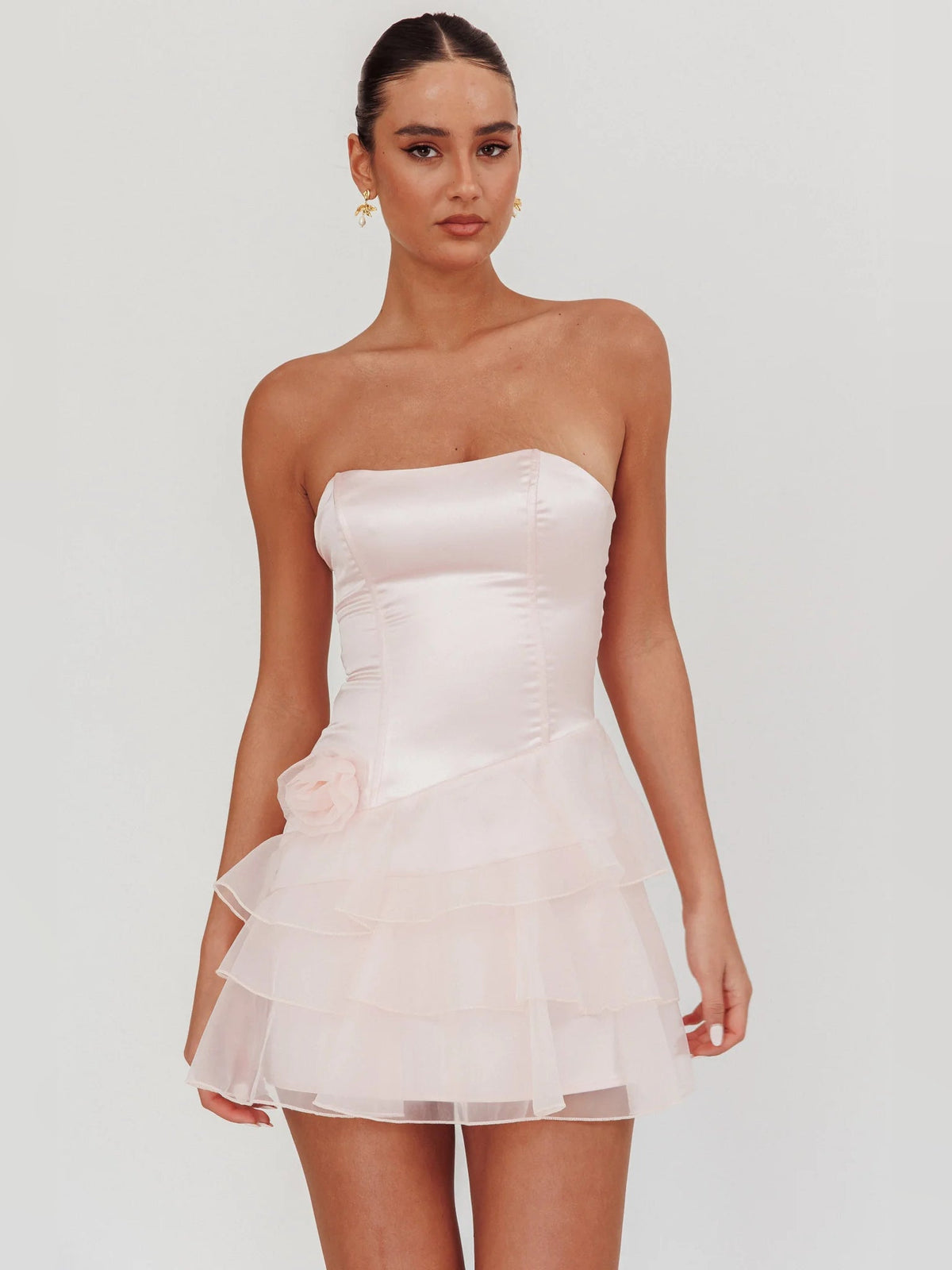 Blush strapless mini organza dress with ruched bodice and layered ruffle skirt