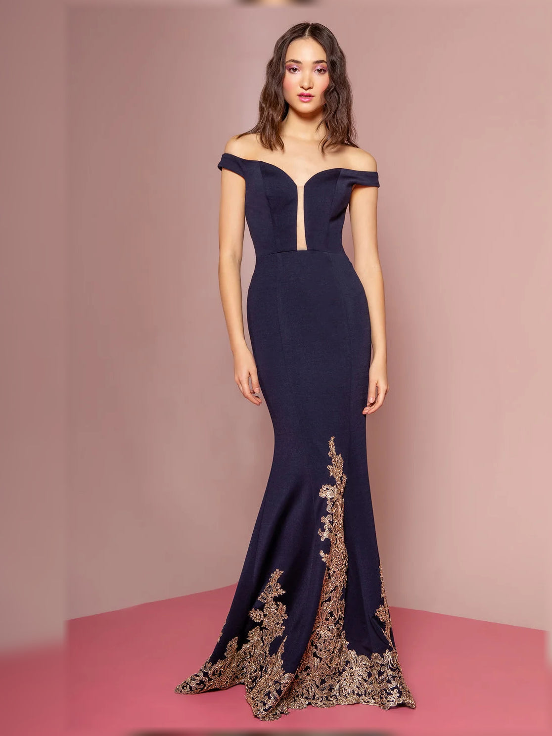 Navy off-shoulder maxi dress with short sleeves and gold floral hem embroidery.