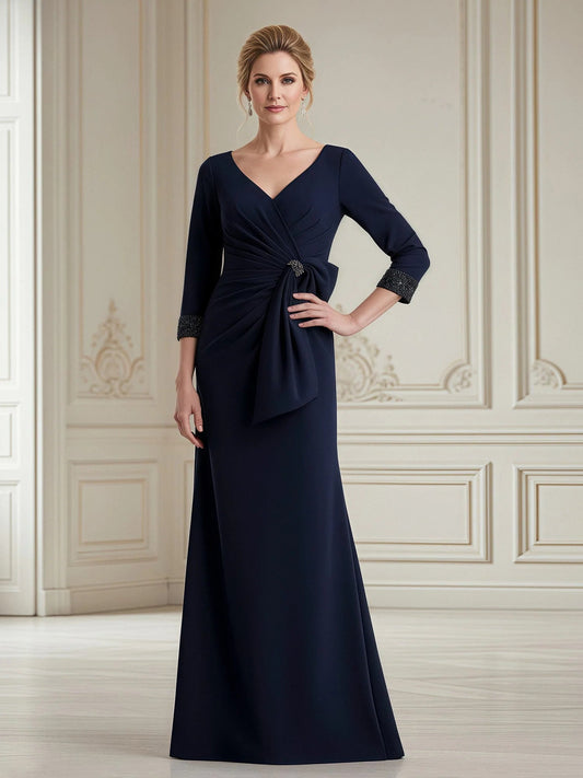 Dark navy floor-length V-neck sheath dress with ruched waist and beaded detail