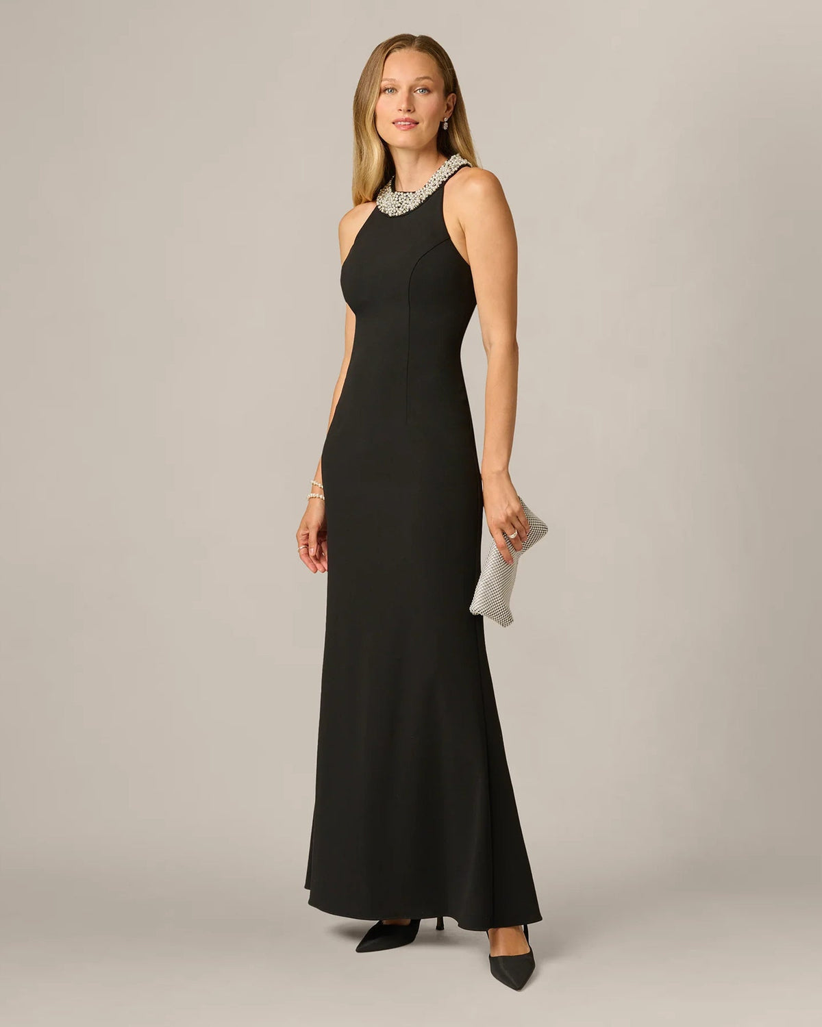 Black halter A-line maxi dress with jeweled neckline and sleeveless fitted bodice