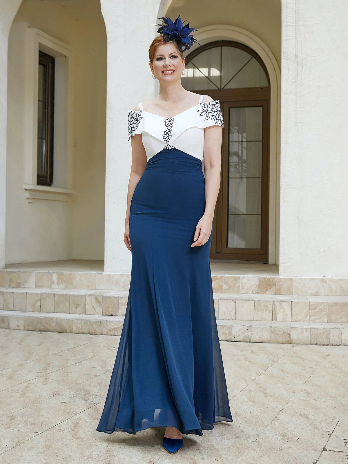 Navy mermaid formal dress with off-shoulder floral embroidery and white bodice panel