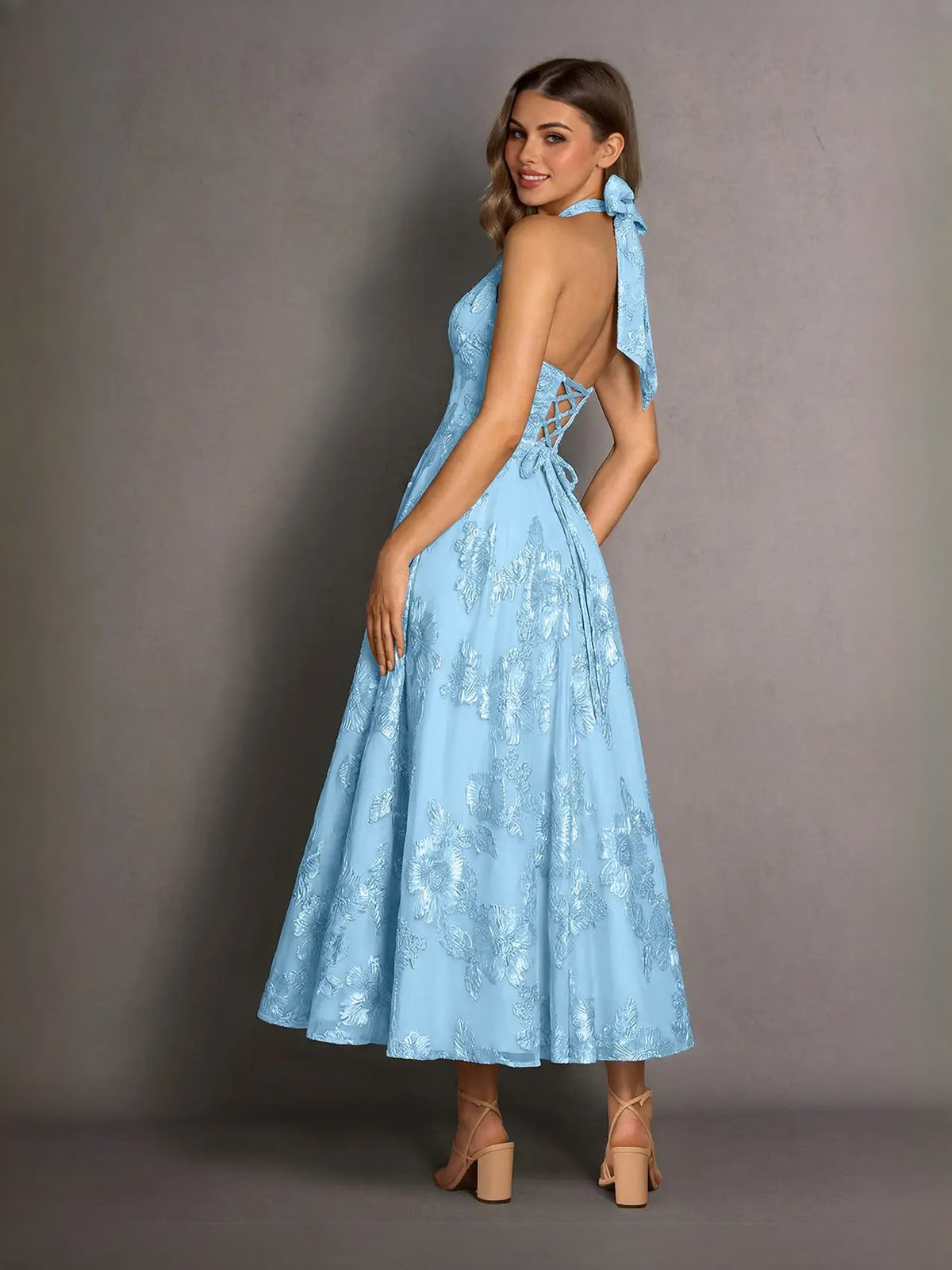Blue halter neck A-line midi prom dress with floral lace and bow tie back