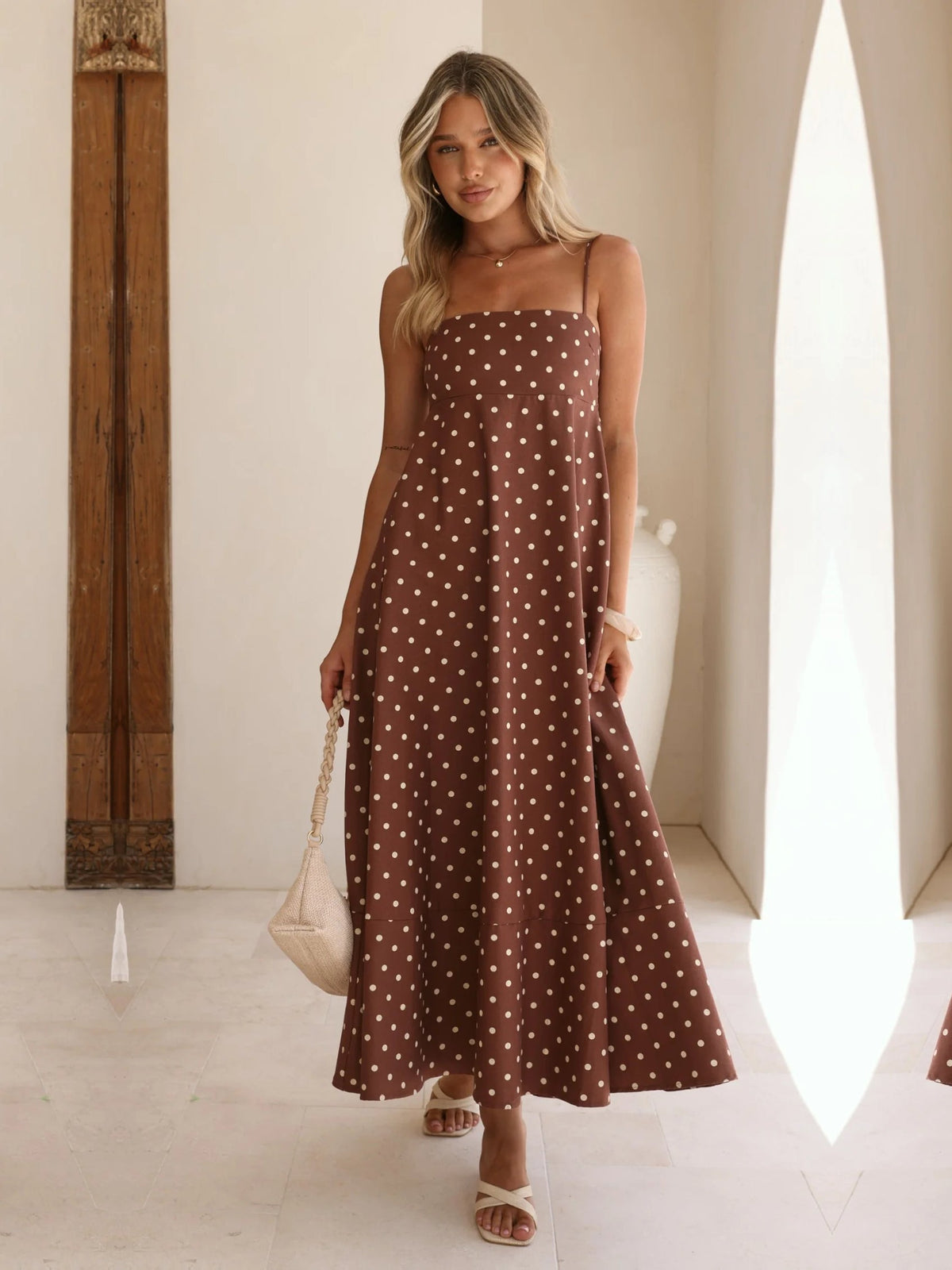Chocolate Cream Polka Dot a-line maxi formal dress with strapless neckline, full-length front view
