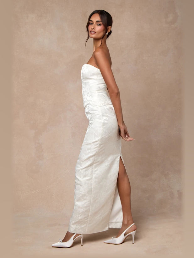 White formal dress with a-line silhouette and maxi length