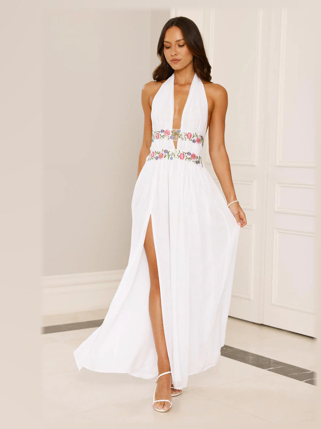 White formal dress with a-line silhouette and maxi length