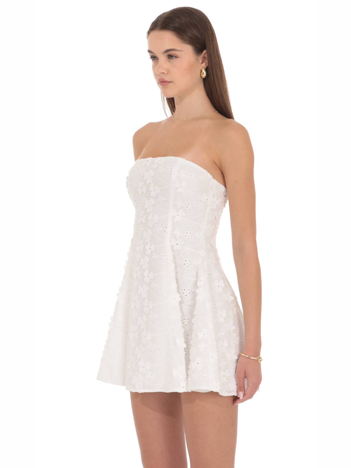 White homecoming dress with a-line silhouette and mini length