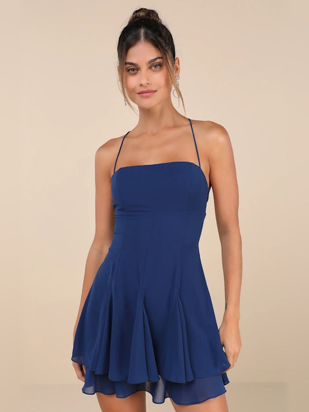 Dark blue pleated tiered mini dress with thin spaghetti straps