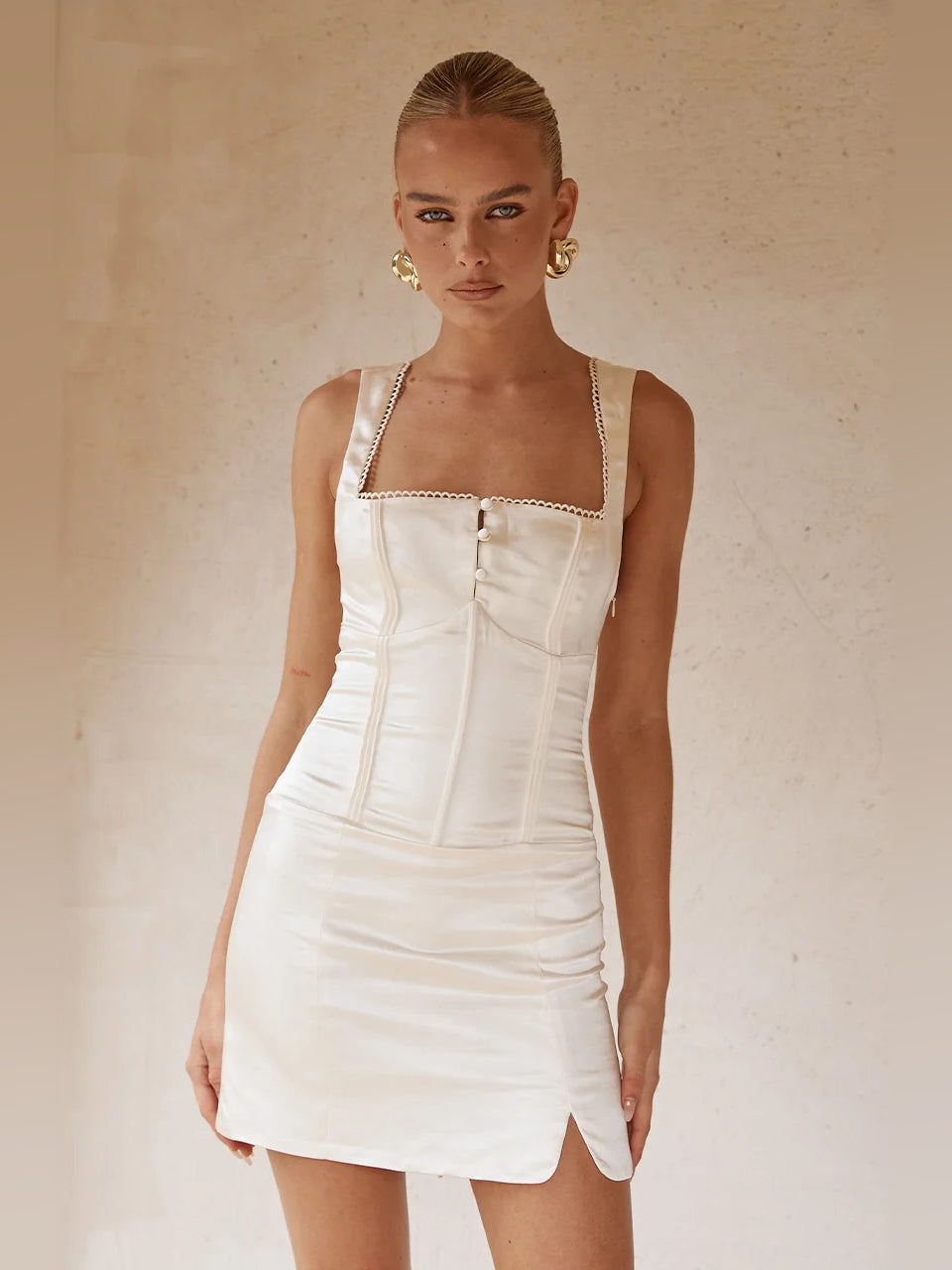 Ivory ruched square-neck bodycon mini dress with spaghetti straps