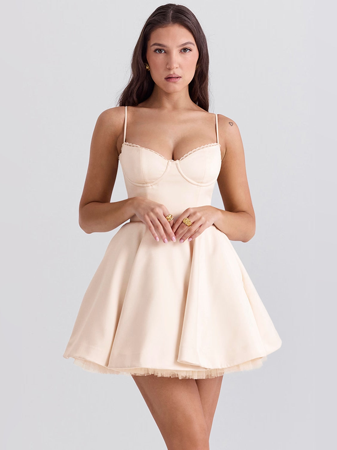 Cream mini homecoming dress with spaghetti straps, sweetheart bodice, tulle trim skirt
