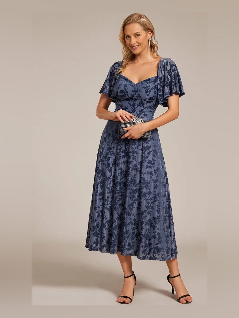 Navy blue A-line midi dress with sweetheart neckline and short puff sleeves