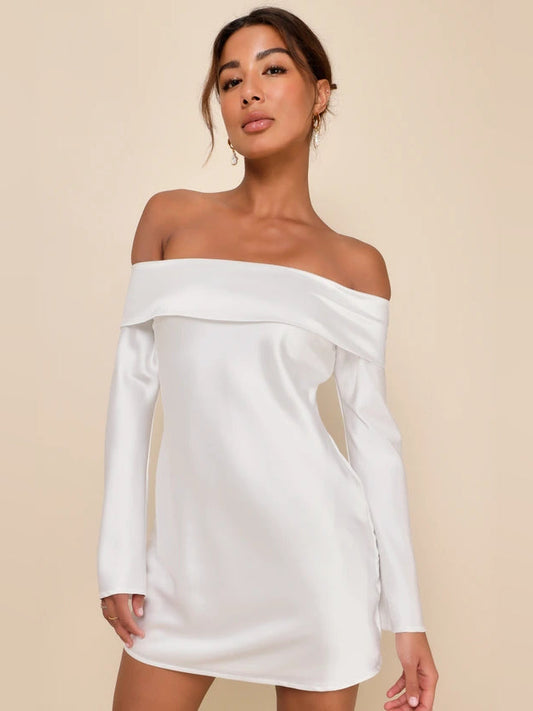 White off-shoulder satin mini dress with long sleeves and draped neckline
