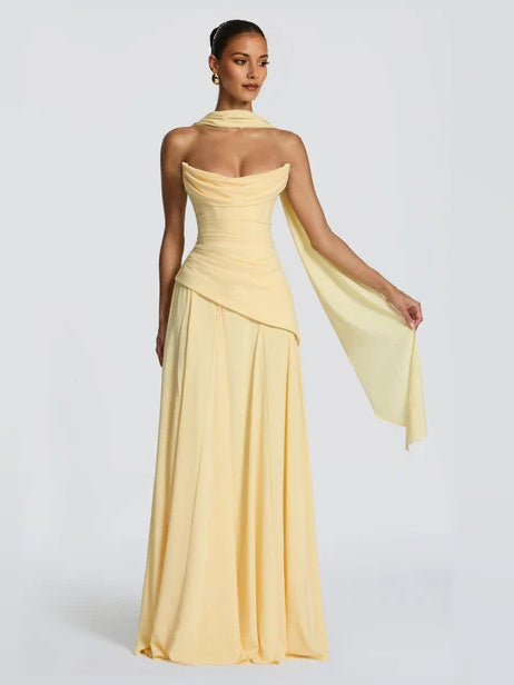 Strapless yellow corset A-line formal dress with draped peplum overlay