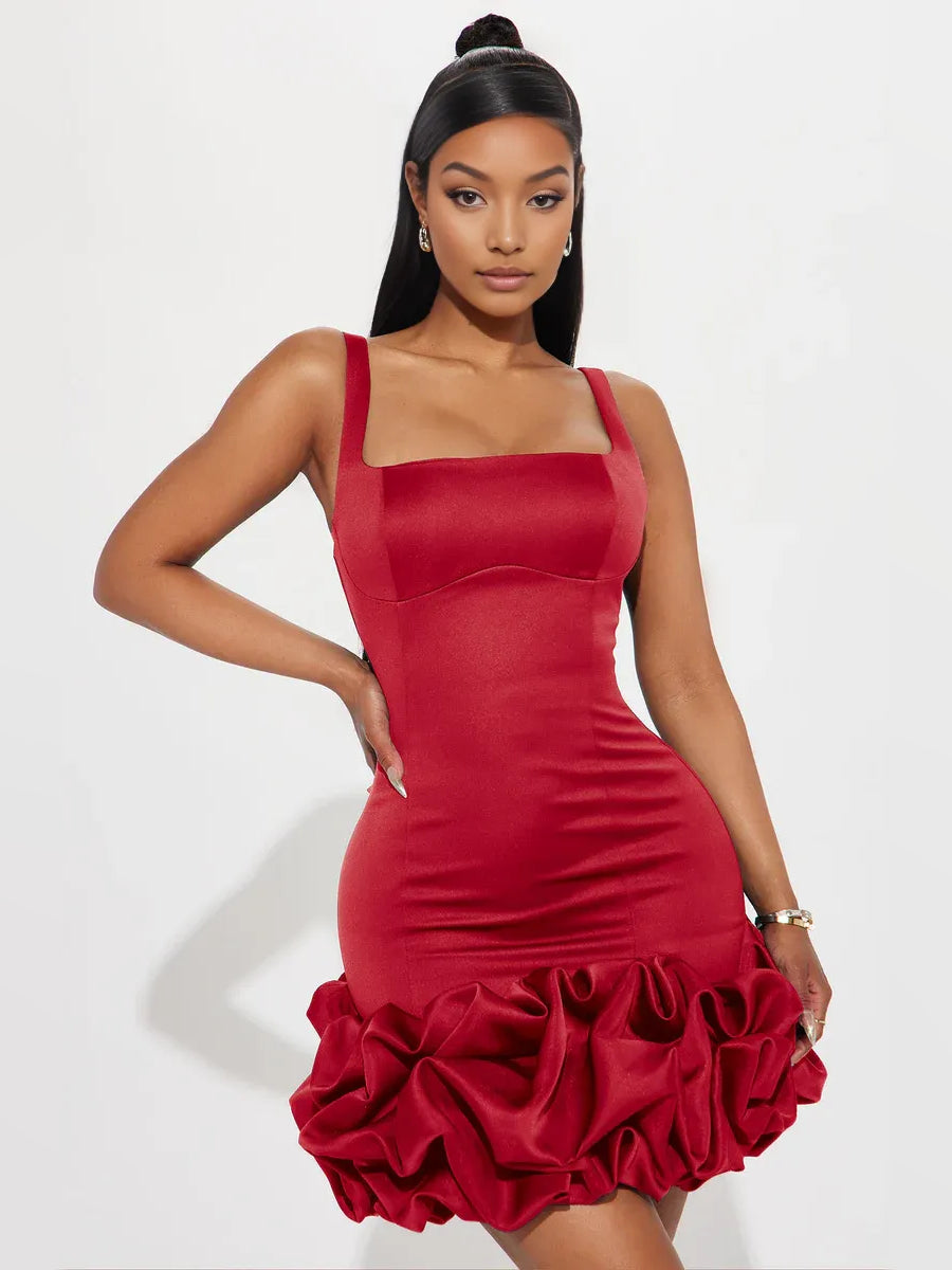 Red satin mini dress with square neckline, spaghetti straps, and ruffled hem
