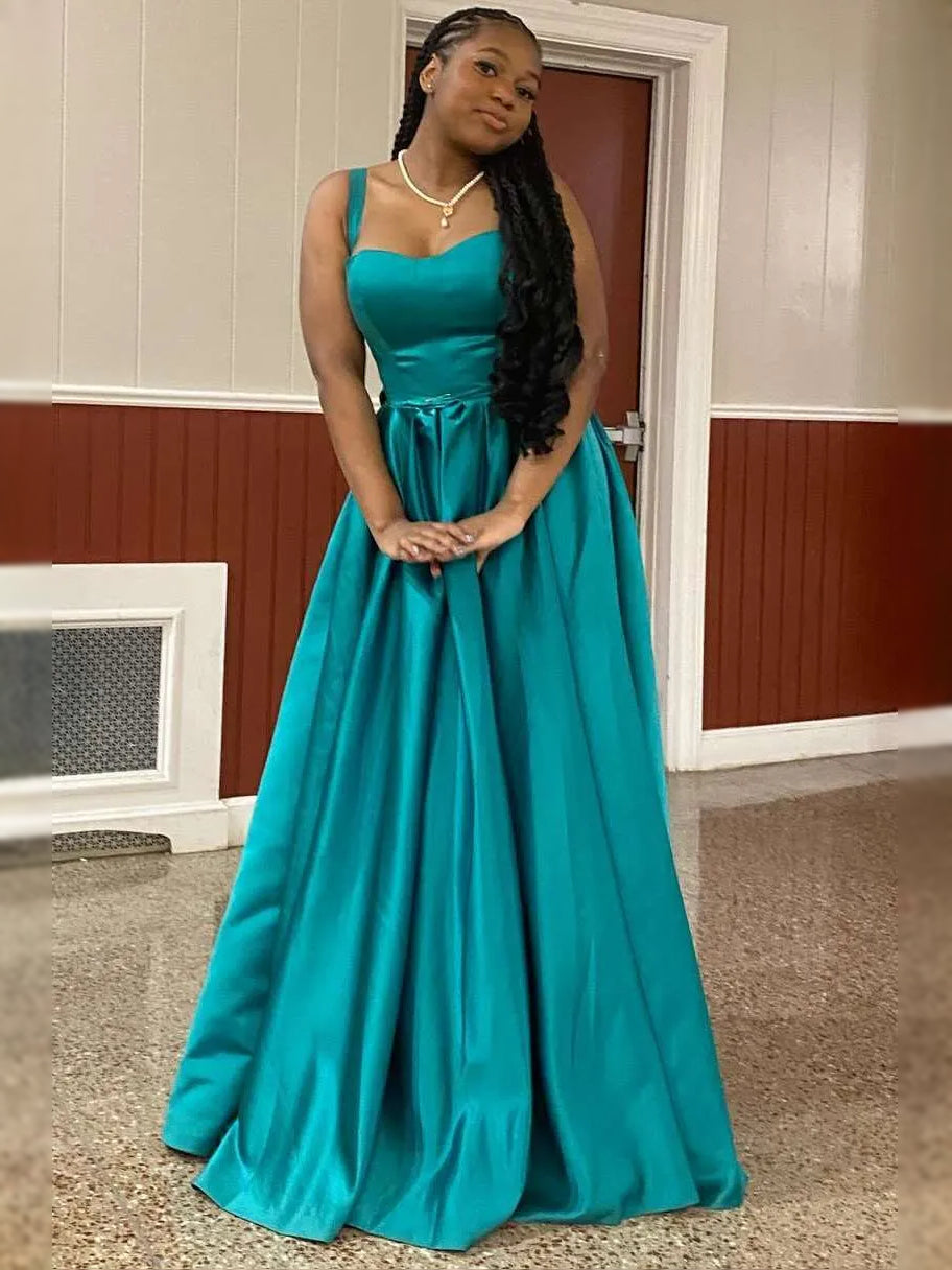 Teal satin sweetheart ball gown with draped waist bow, sleeveless, full-length skirt