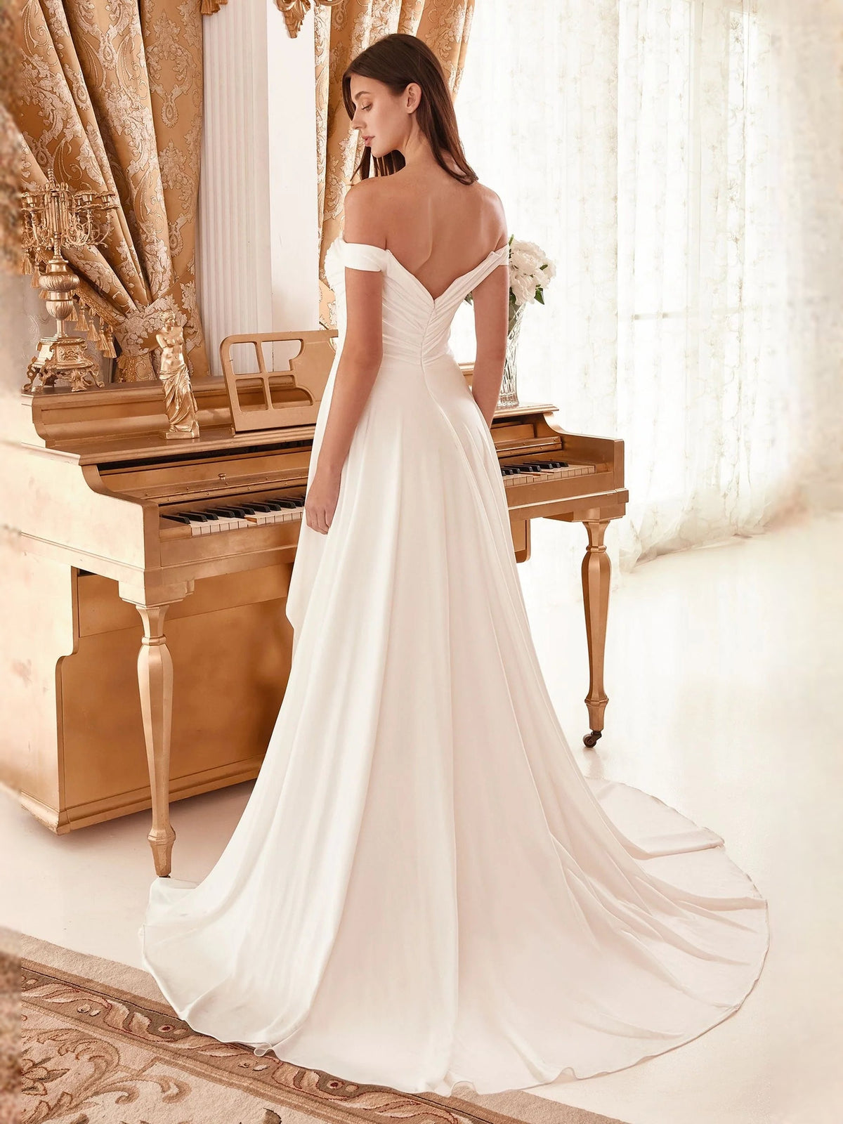 Ivory off-shoulder ruched mermaid wedding dress with draped bodice and front slit