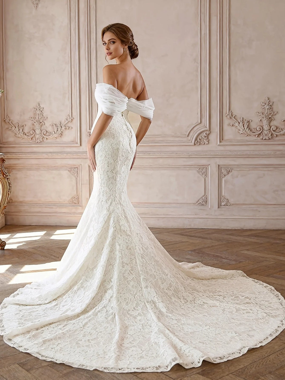Ivory off-shoulder lace mermaid wedding dress with draped sleeves and extended train