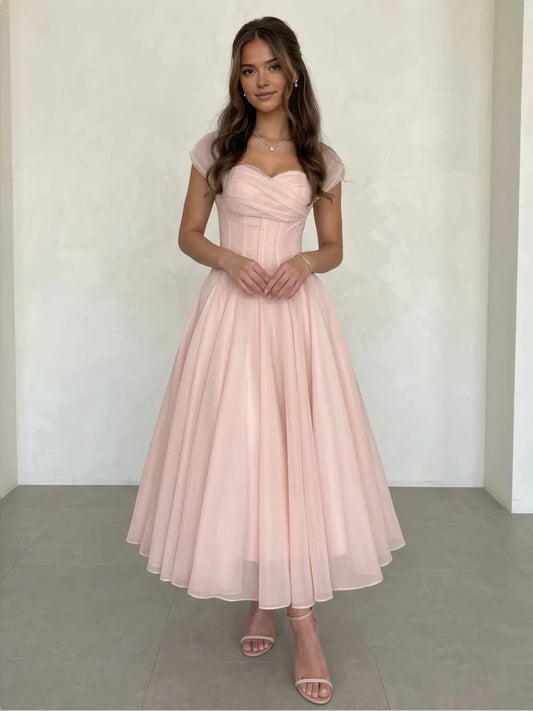 Blush pink pleated sweetheart A-line tea-length chiffon wedding dress