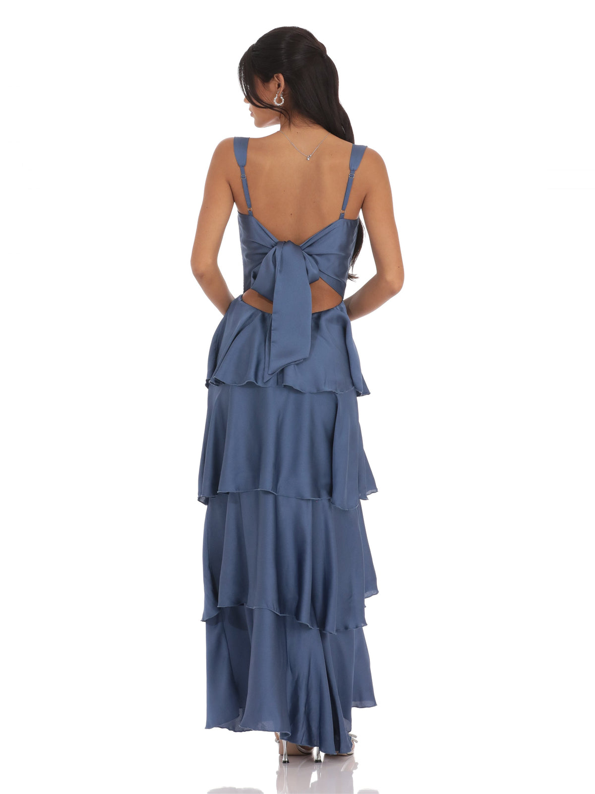 Slate blue satin maxi dress with bow-back detail and tiered ruffle A-line skirt.