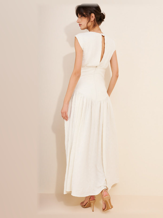 White formal dress with a-line silhouette and maxi length