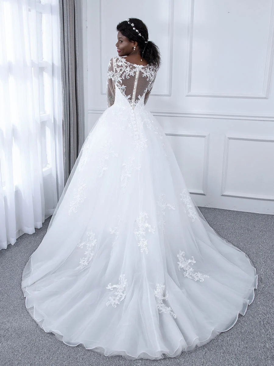 Ivory A-line tulle wedding dress with floral lace applique, round neck, long sleeves, back view