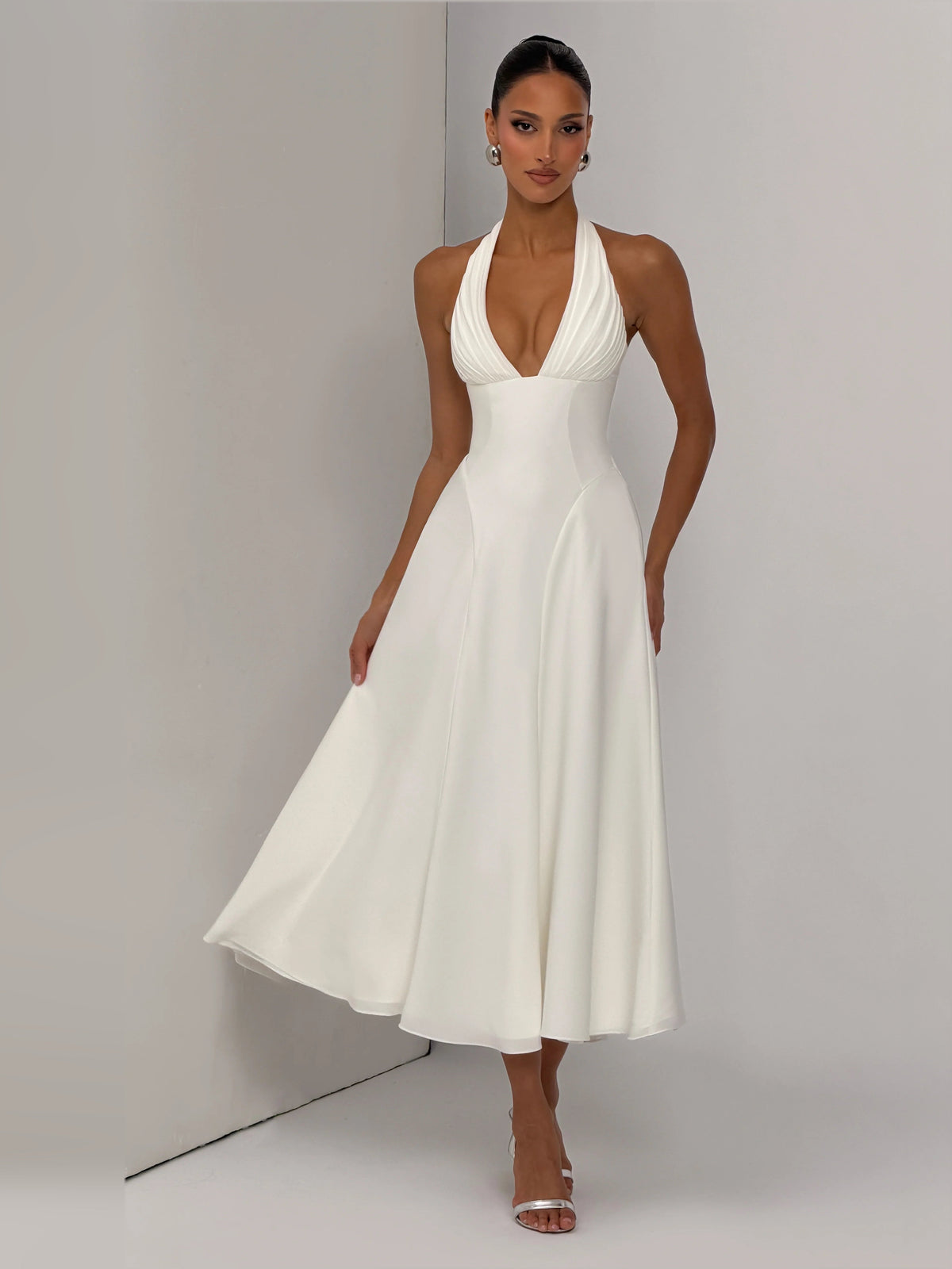 Ivory halter V-neck midi formal dress with pleated bodice and flared skirt
