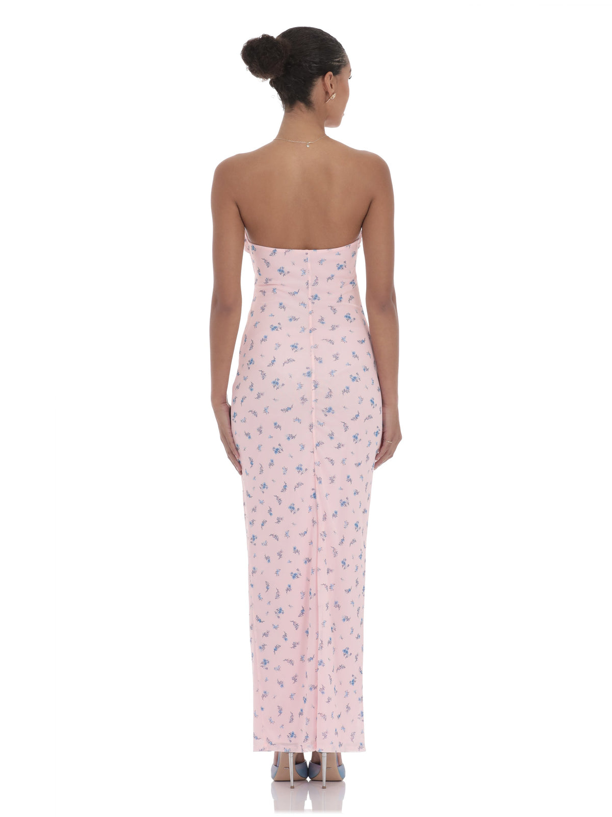 Pink strapless A-line maxi dress with blue floral print and tied bow; back view