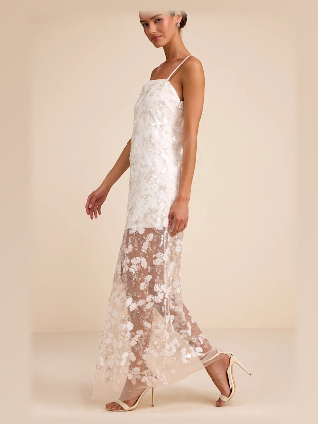 White formal dress with a-line silhouette and maxi length