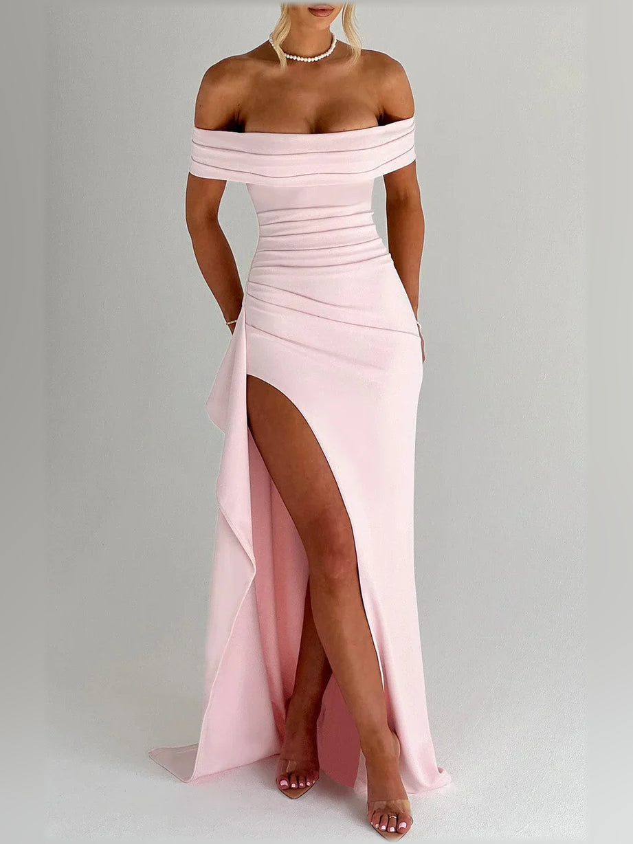 Blush off-shoulder formal dress with ruched bodice, ruffle trim, thigh slit.