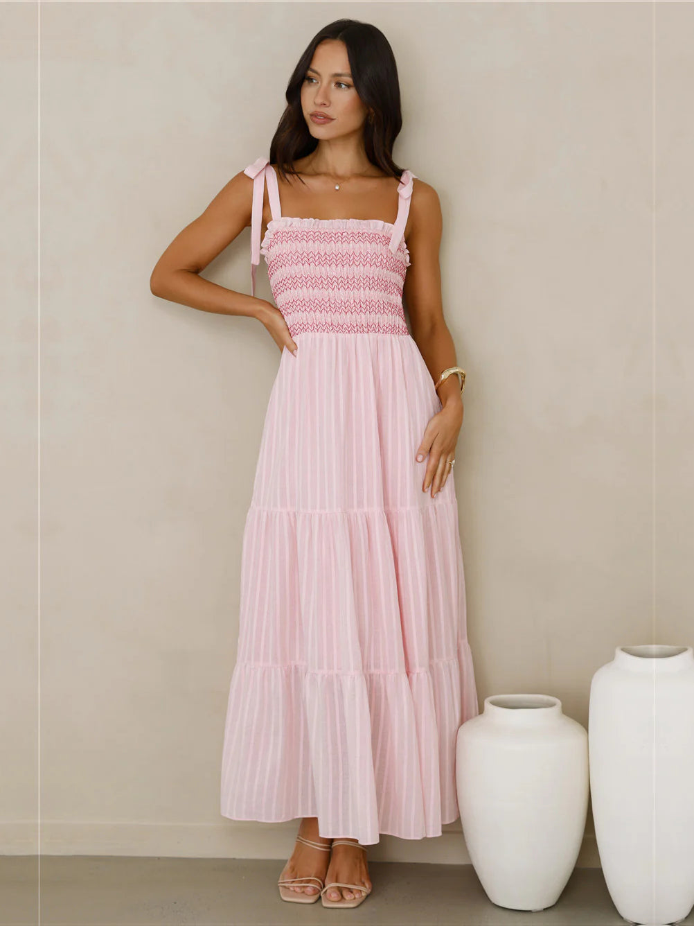 Pink a-line maxi formal dress with square neckline, full-length front view