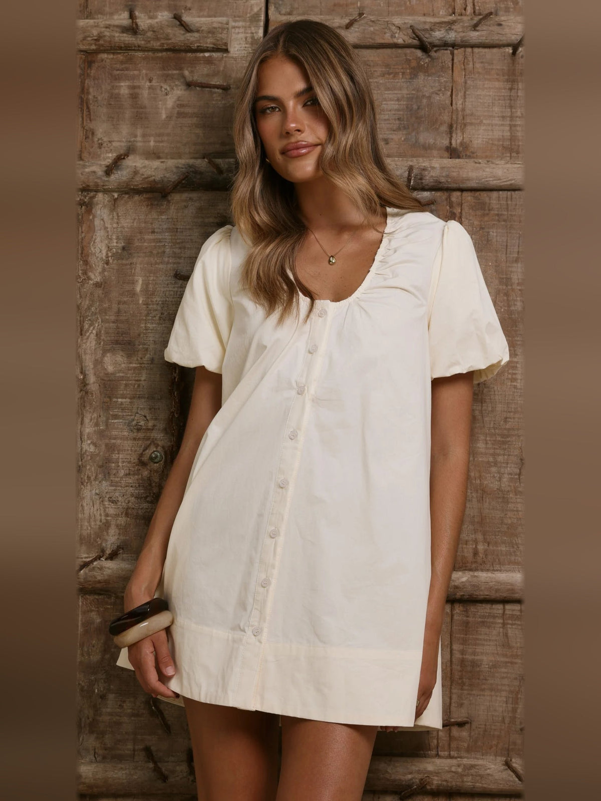 Butter button-front mini dress with short puff sleeves, square neckline