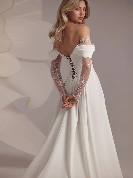Ivory off-shoulder satin A-line wedding dress with corset bodice and lace sleeves