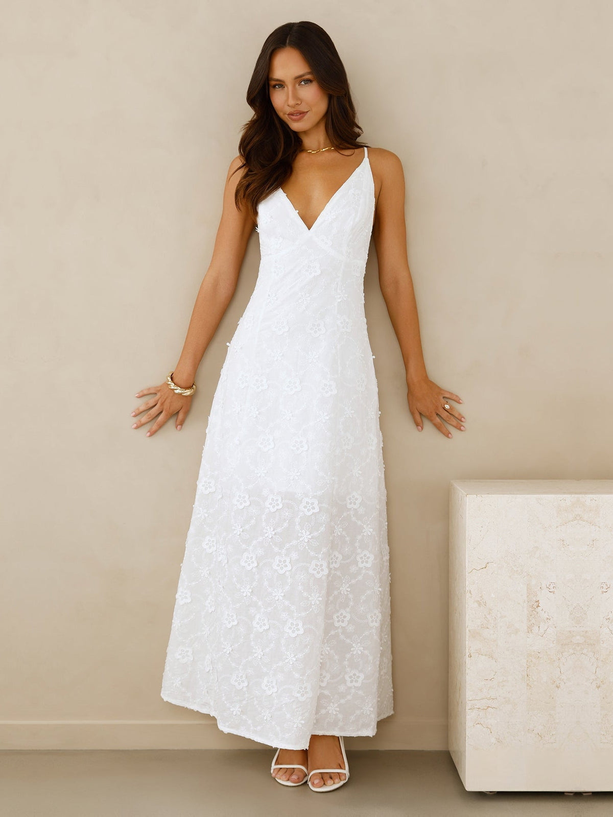 White a-line maxi formal dress with V-neckline, full-length front view