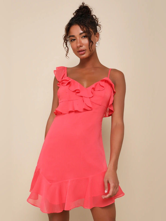 Coral pink mini dress with layered ruffle bodice and asymmetrical frill straps