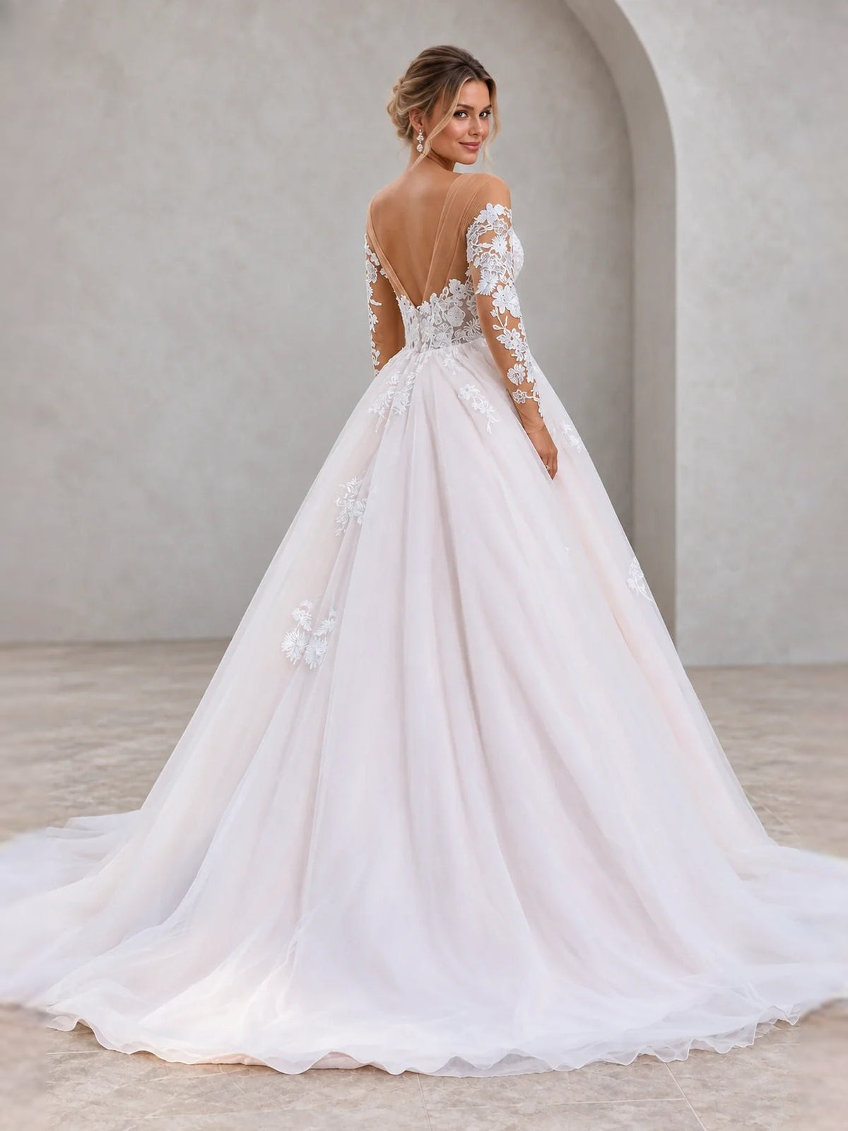 Ivory A-line wedding dress with sweetheart neckline and floral lace applique sleeves