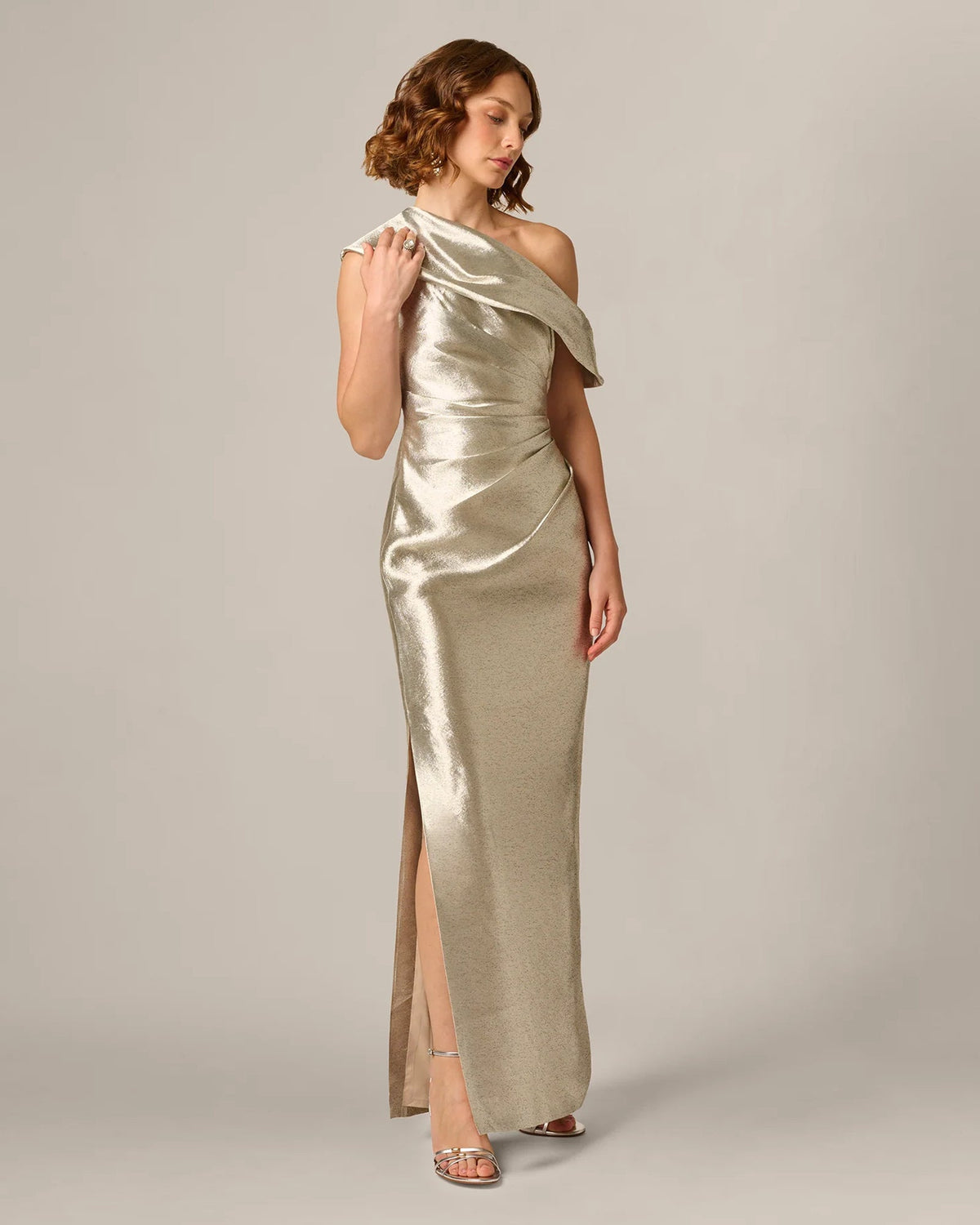 Light gold metallic one-shoulder draped A-line maxi dress with side slit