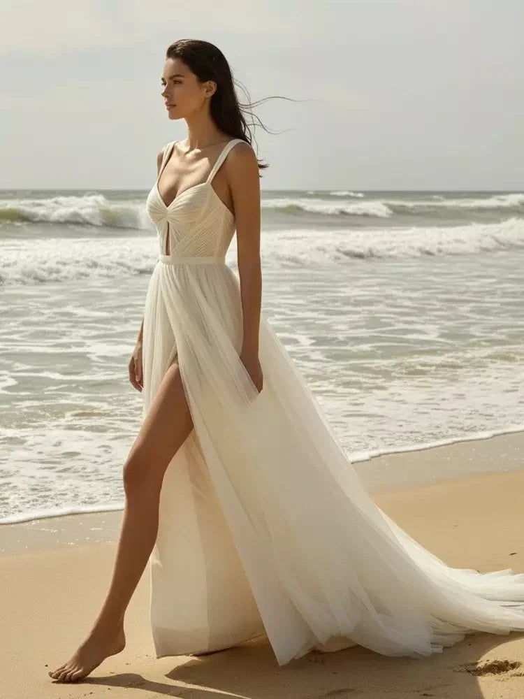 Ivory chiffon A-line wedding dress with sweetheart neckline and draped ruched bodice