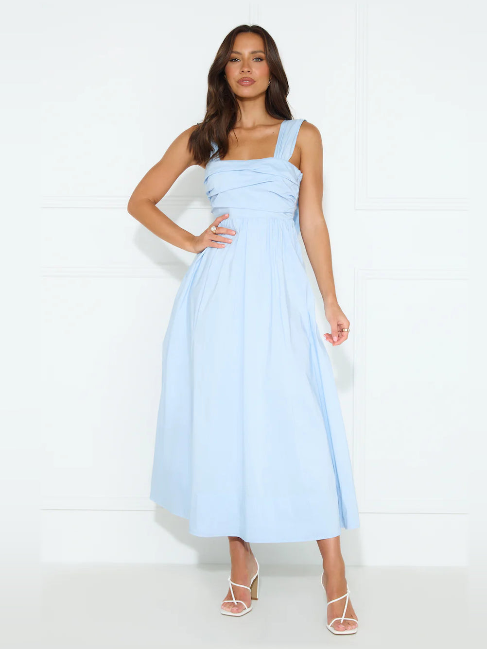 Light blue sleeveless midi formal dress with square neckline and gathered waist
