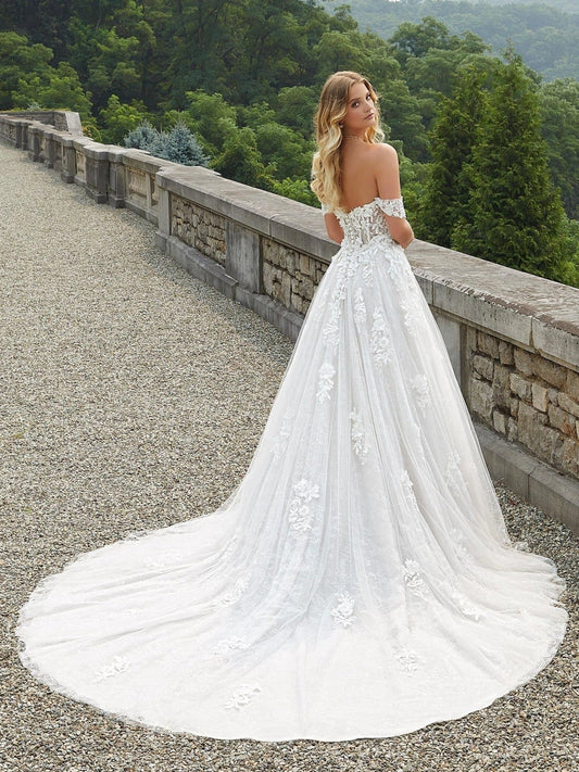 Ivory tulle A-line wedding dress, floral lace appliques, sweetheart corset bodice