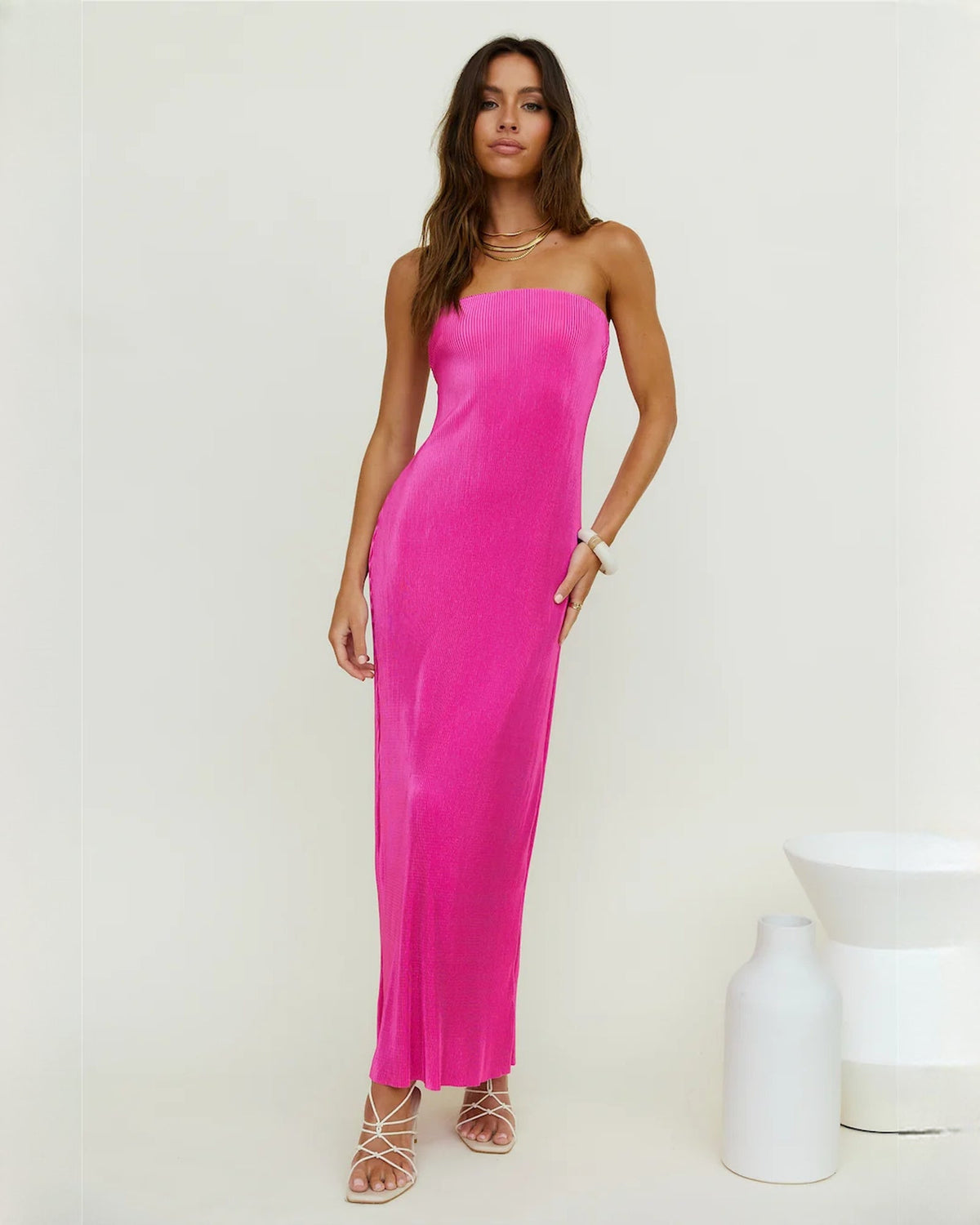 Pink strapless satin maxi dress with sweetheart neckline and A-line silhouette