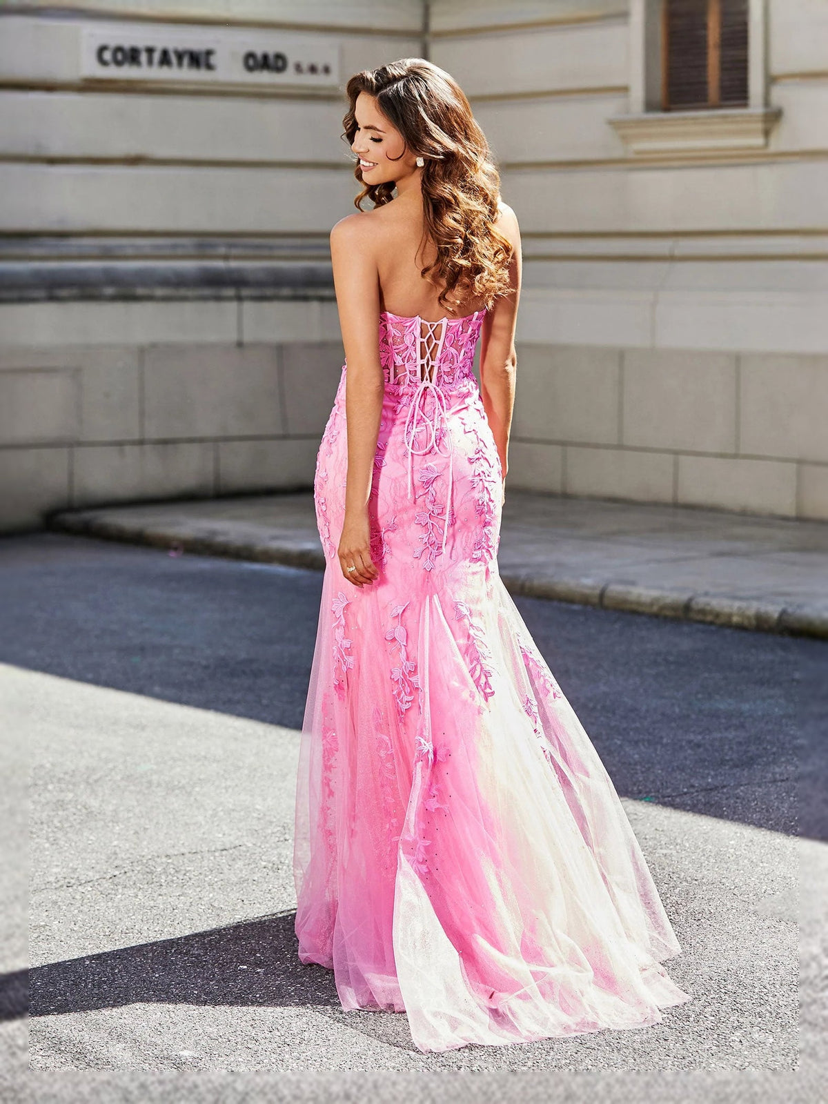 Pink corset sweetheart mermaid prom dress with floral lace and draped tulle back