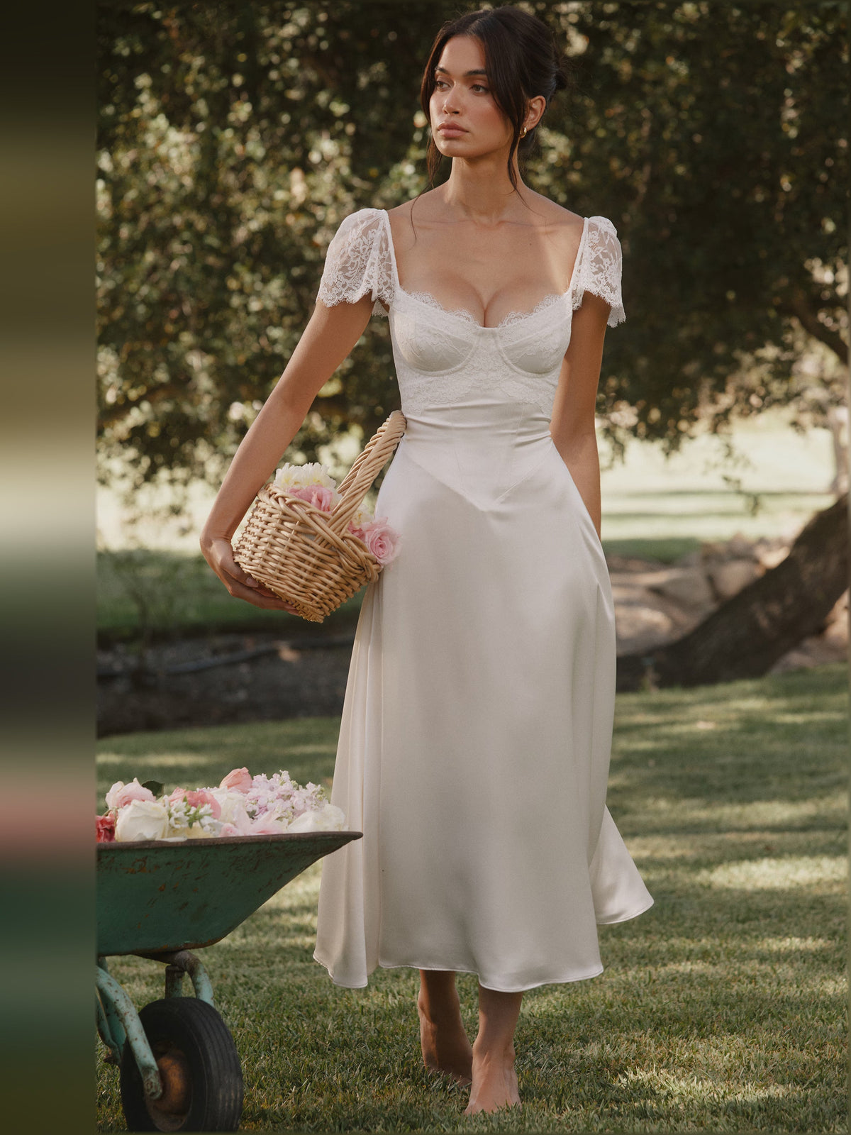 White satin midi dress with lace sleeves and sweetheart neckline