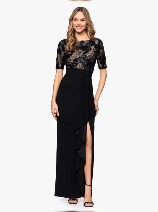 Black floor-length mother-of-the-bride dress with embroidered lace bodice and draped skirt