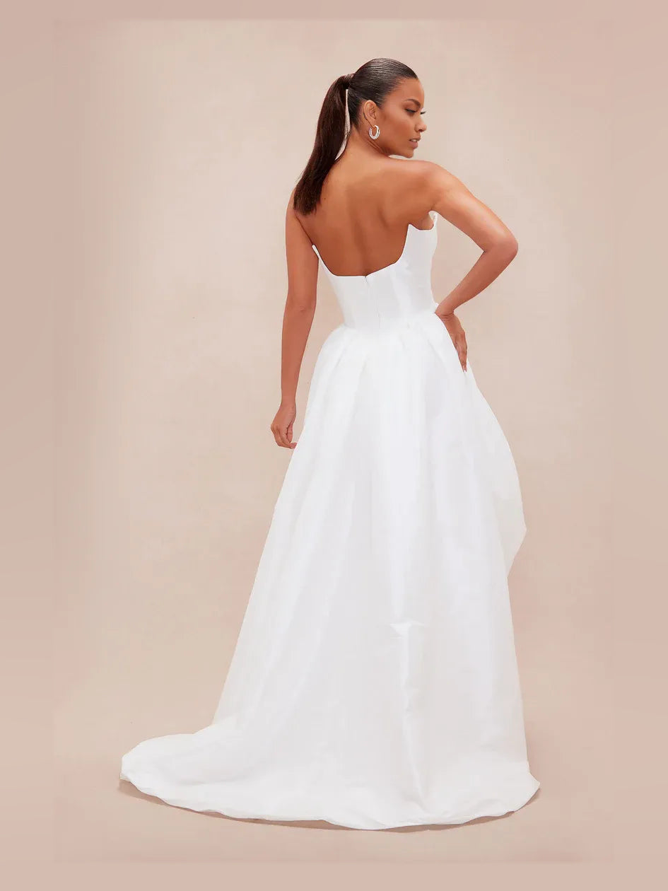 White strapless corset high-low A-line dress, draped back view with gathered waist