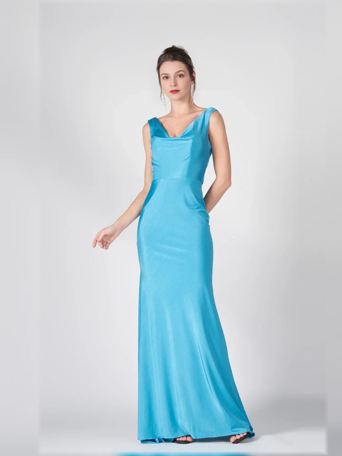 Caribbean blue floor-length mermaid formal dress with V-neckline and draped bust