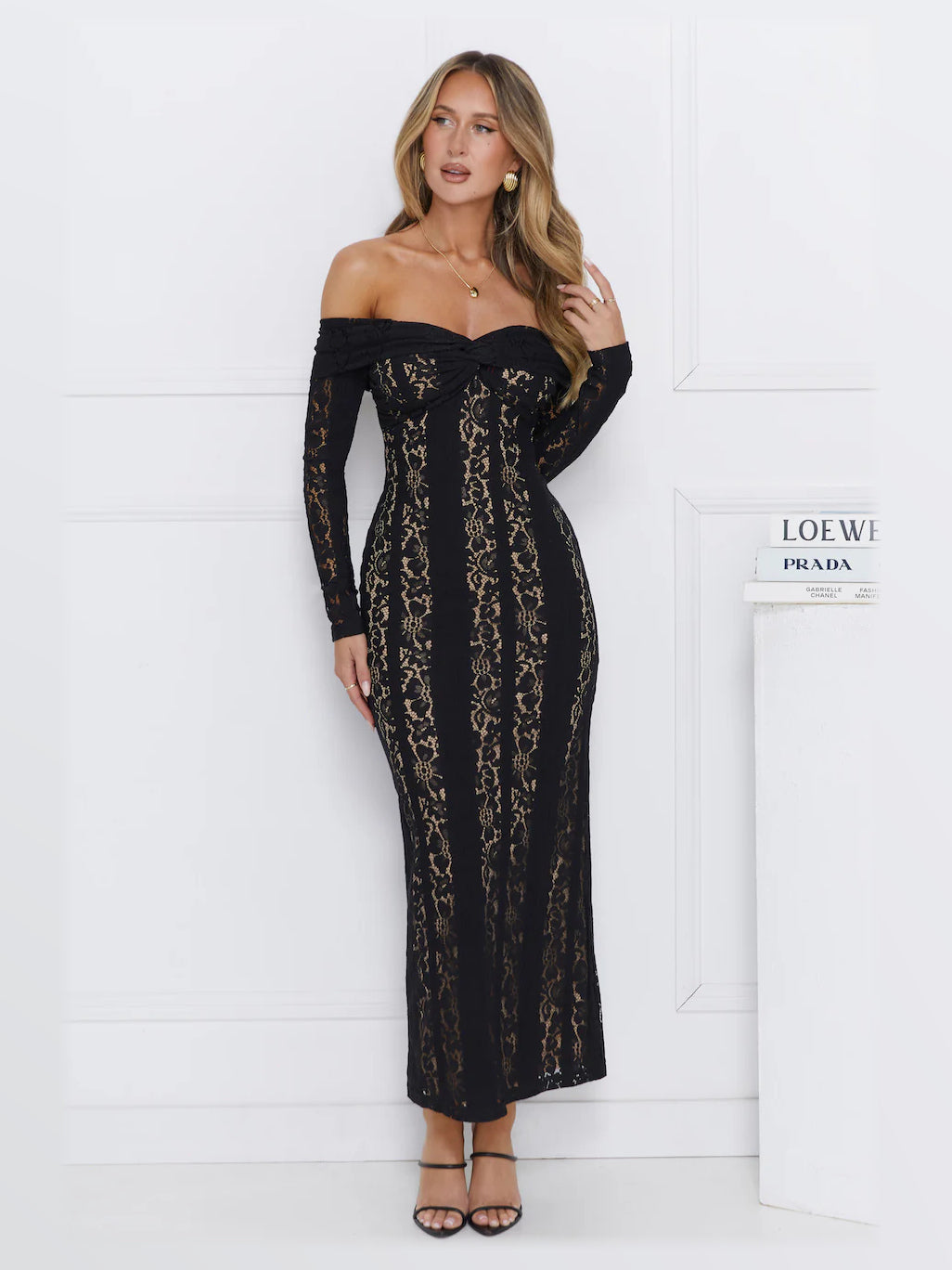 Black midi formal dress, front full-length view showing the neckline